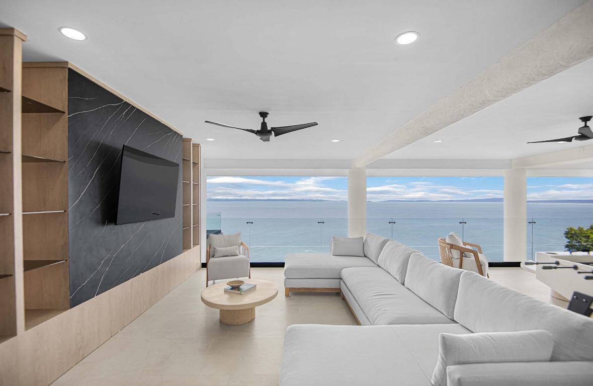 Punta Leona living room opening to the Pacific